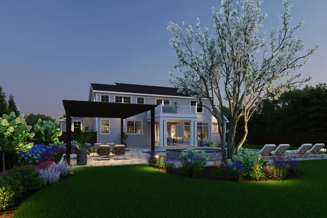 Dusk rendering of the rear elevation with the pergola and planting lit