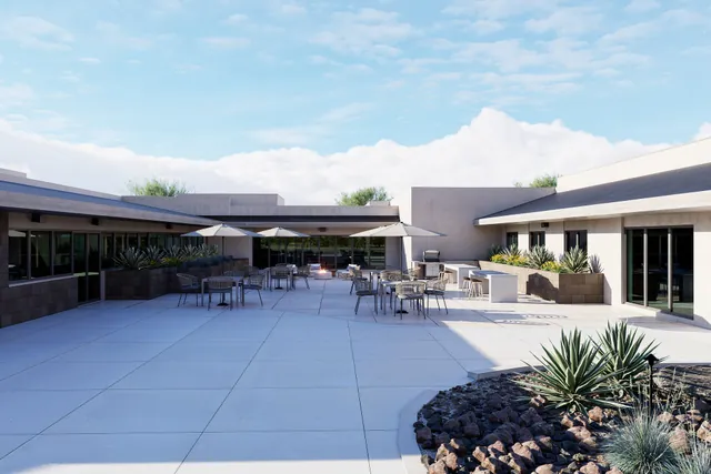 Rendering of the cafe patio with tables and umbrellas